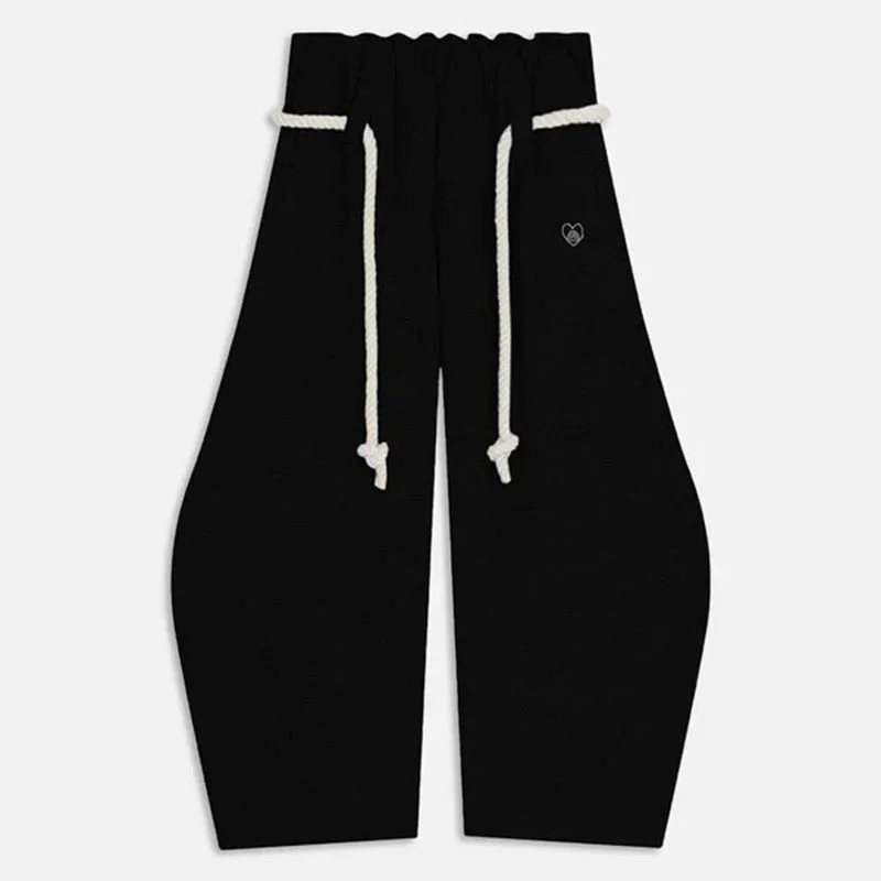 سراويل طويلة ذات خصر مرن وواسعة الساق بلون سادة للرجال والنساء، مناسبة لفصول الخريف والشتاء.