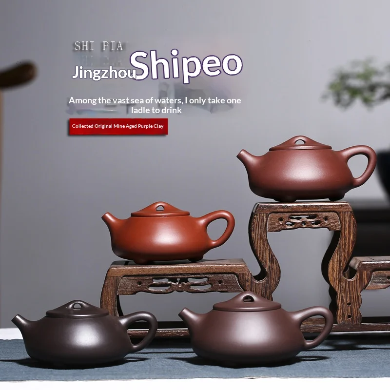 

Yixing fully handmade purple clay teapot, Shi Piao style with internal seal and ball hole