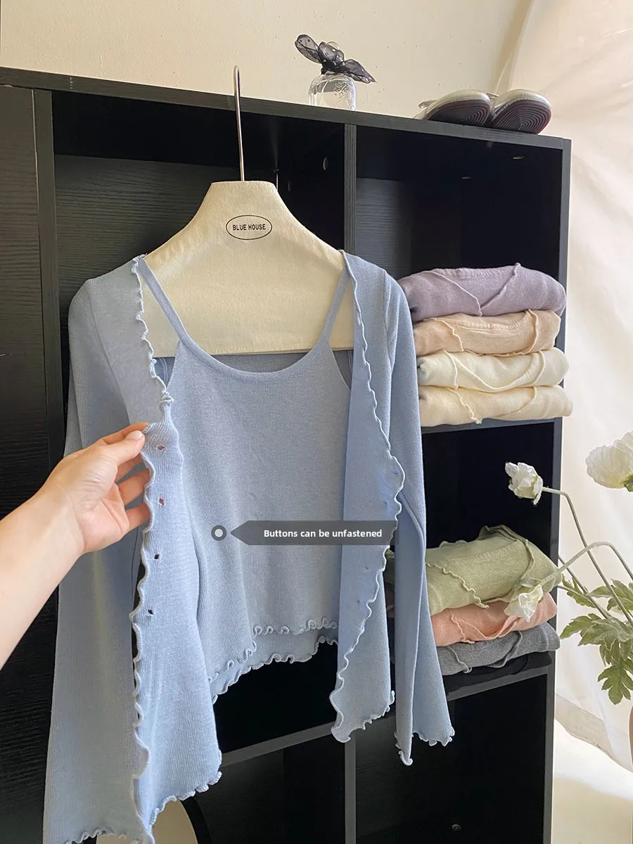 كارديجان نسائي رقيق بأكمام طويلة وتصميم أنيق، قطعة علوية كاجوال بلون واحد وتصميم يشبه الأذن، إطلالة من قطعتين لفصل الربيع