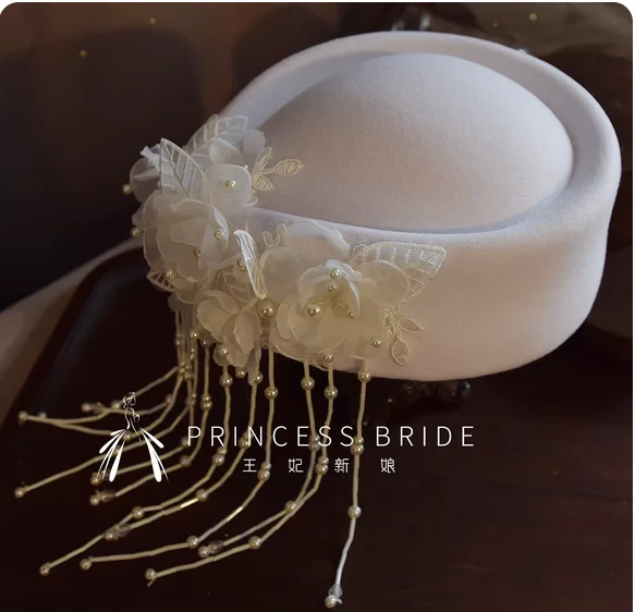 Princess new bride retro elegant wedding dress small hat British headdress heavy handmade tassel antique cheongsam hat.