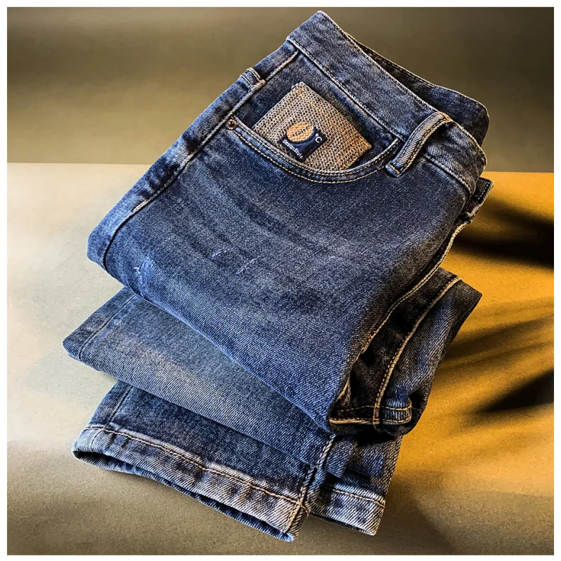 

2025 autumn new men's clothing jeans men's slim fit small foot elastic trend versatile high-end pants