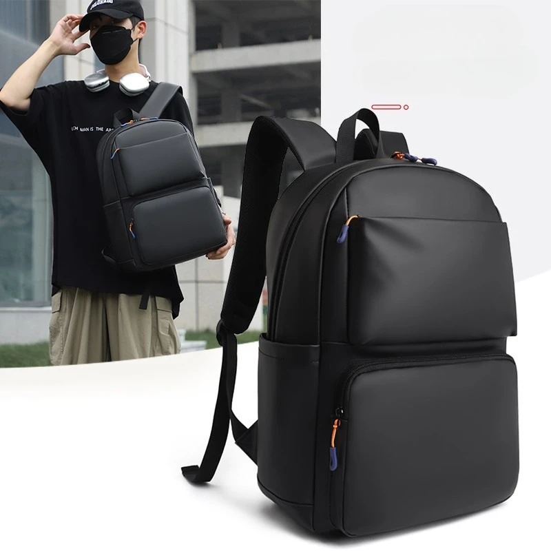 Europe and the United States new men's backpack large-capacity solid color simple business backpack sports travel computer bag.