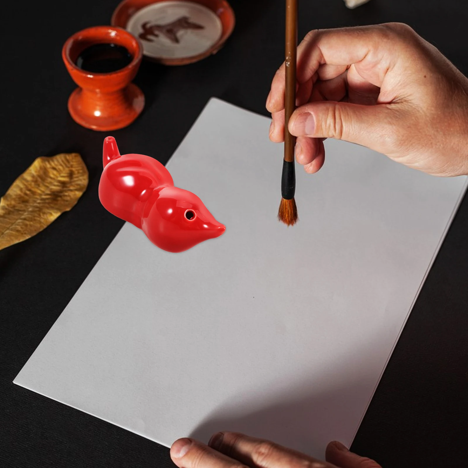 

Porcelain Calligraphy Water Dropper with Symbolic Gourd Shape Fine Craftsmanship Ink Usage Control Ideal for Artists Collectors