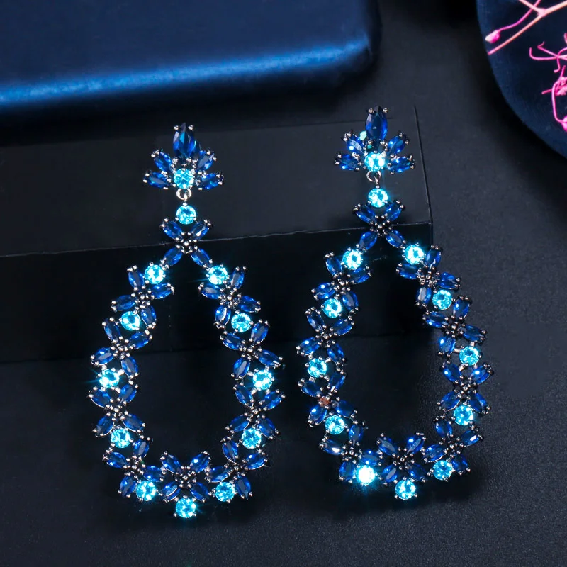 

ThreeGraces Unique Dark Blue Cubic Zirconia Black Gold Color Long Dangle Drop Earrings for Ladies New Fashion Prom Jewelry E1212