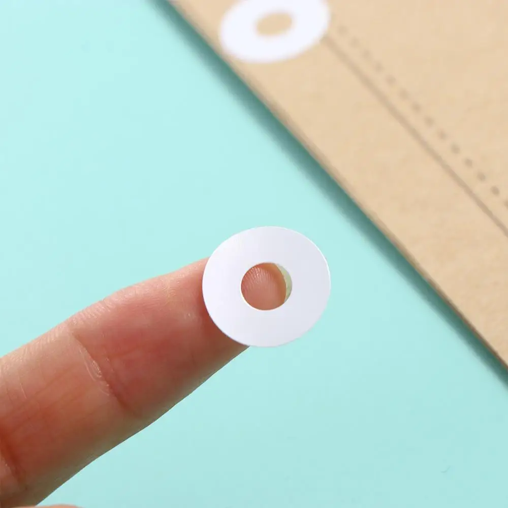 Anello di rinforzo autoadesivo Etichette di rinforzo per fori a fogli mobili Adesivo di carta per rilegatura Adesivi rotondi Protezione per punzonatrice