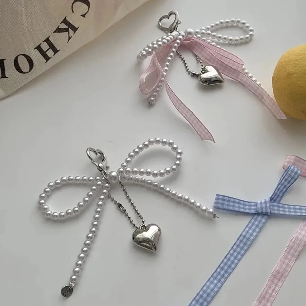 

Y2K Beaded Pearl Key Chain Heart Pendant Pink Blue Bow Tie Bag Phone Accessory Delicate Ornament Key Ring for Fashion Lovers