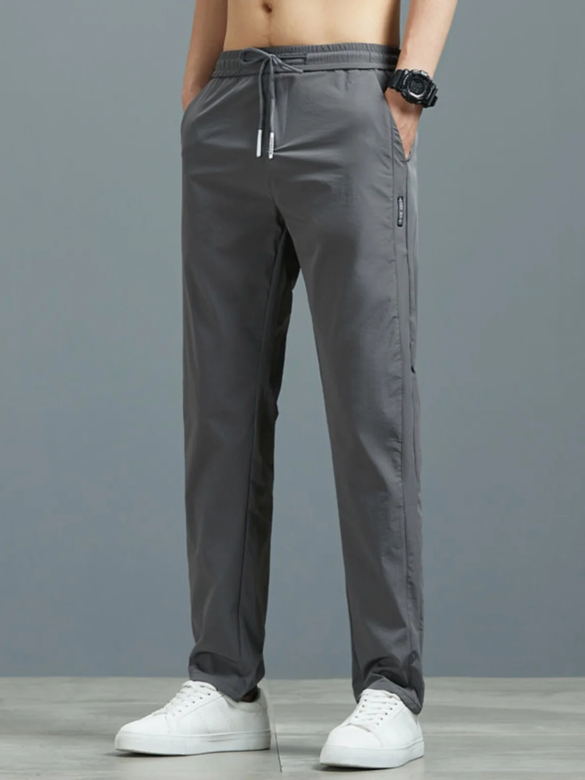 กางเกงลำลองผ้าไหมน้ำแข็งสำหรับผู้ชายฤดูร้อนบางสวมใส่ทนสปอร์กันฝุ่นหลวมกางเกงขายาวบลาเอวต่ำแนวโน้มเยาวชน