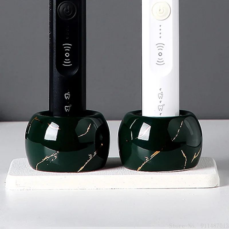 

Electric toothbrush holder rack free punch swing table diatom mud toothbrush holder home bathroom countertop storage wash cup