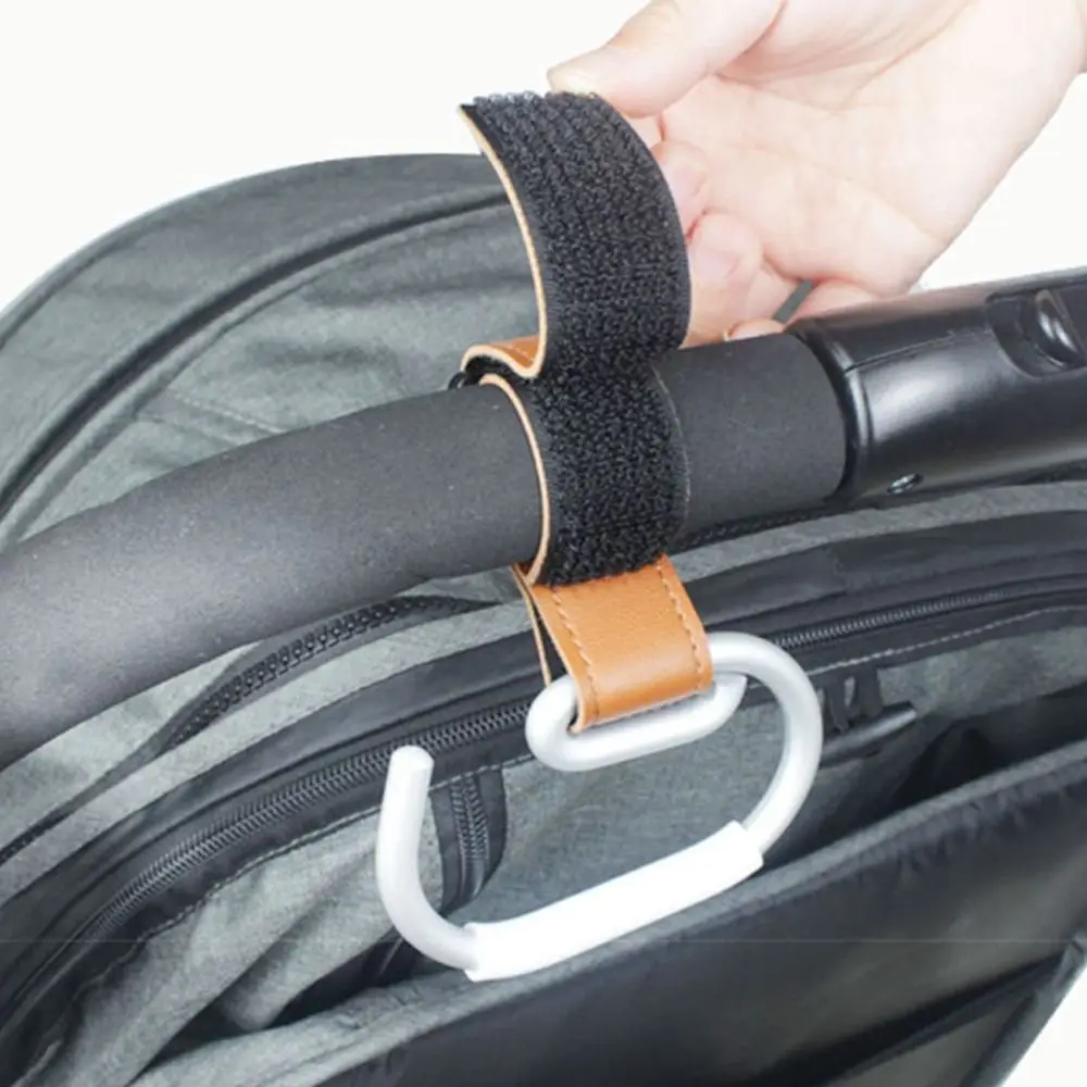 Ganchos para cochecito de bebé de PU, organizador de carrito, gancho colgante de Color sólido, accesorios para cochecito, accesorios para cochecito de dibujos animados, bicicleta