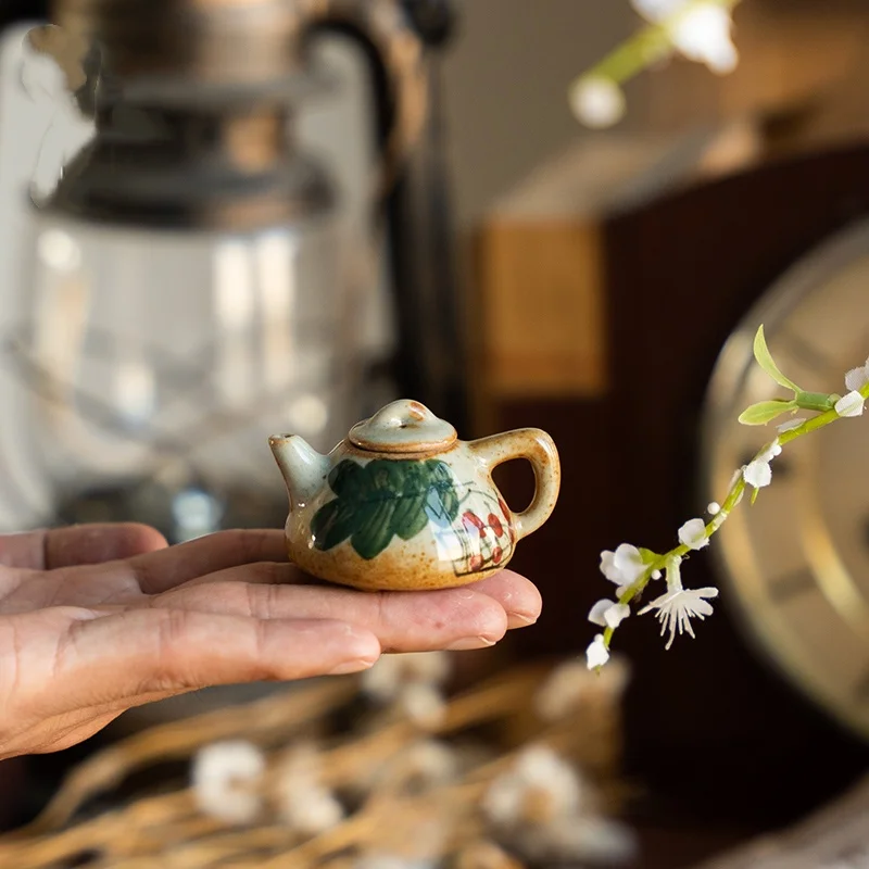 

Jingdezhen hand-painted small ceramic teapot toy ornaments Statue creative crafts