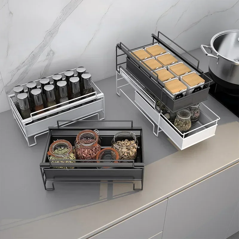 

-Kitchen countertop pull-out seasoning storage rack Multiple layers of storage and organization in the cabinet Lower sink