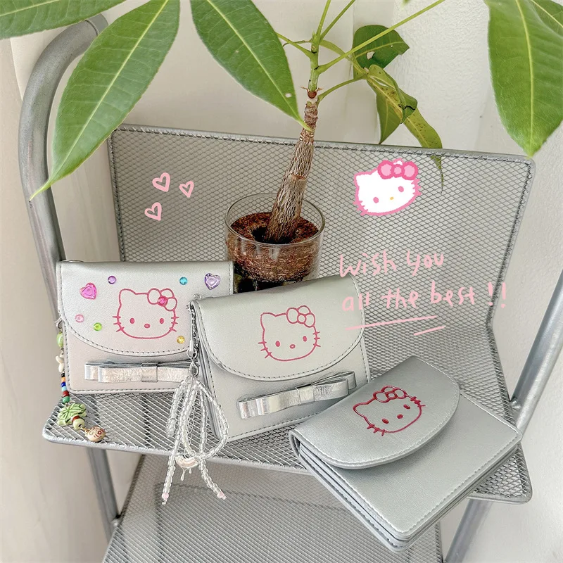 

Sanrio Hello Kitty корейская версия женский кошелек серебряный короткий милый нулевой кошелек простой новый модный студенческий кошелек с героями мультфильмов сумка для карт