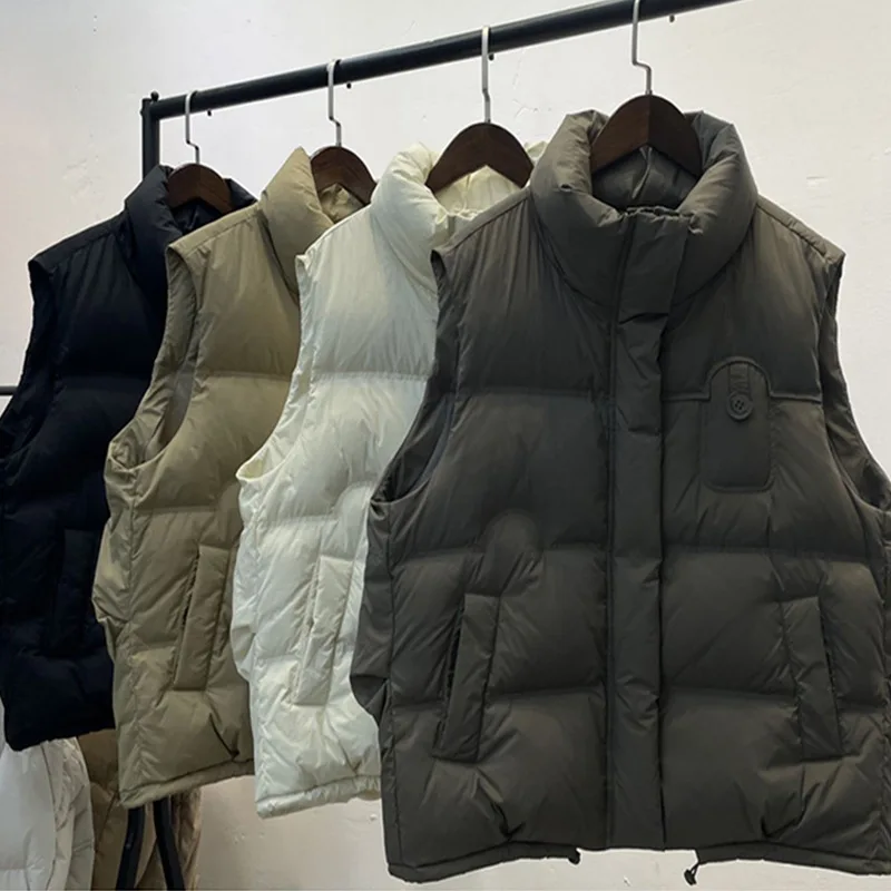 Chaqueta de plumón para mujer, nuevo abrigo de invierno europeo, chaleco sin mangas, chaleco grueso y cálido, chaleco con cuello levantado a rayas para mujer 2025