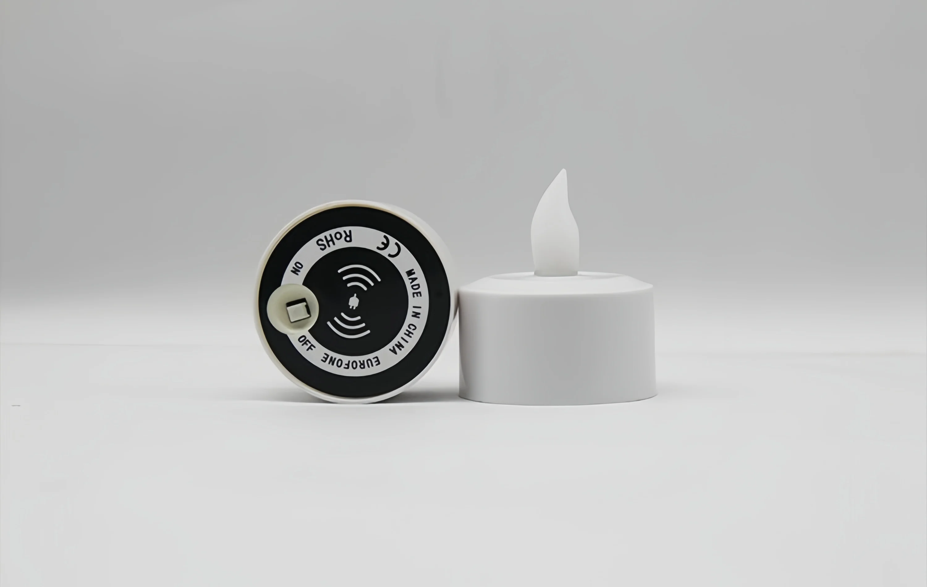 Pack of  12 Wireless charging rechargeable Led Tealight Multicolor Electronic Candle Lamp with 12 keys remote controller Wedding