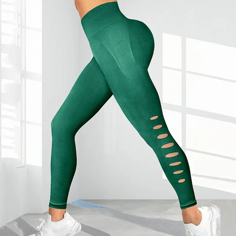 Nuovi leggings sportivi da donna scavati Pantaloni sportivi da yoga Abbigliamento sportivo da fitness Collant da palestra push up a vita alta sexy