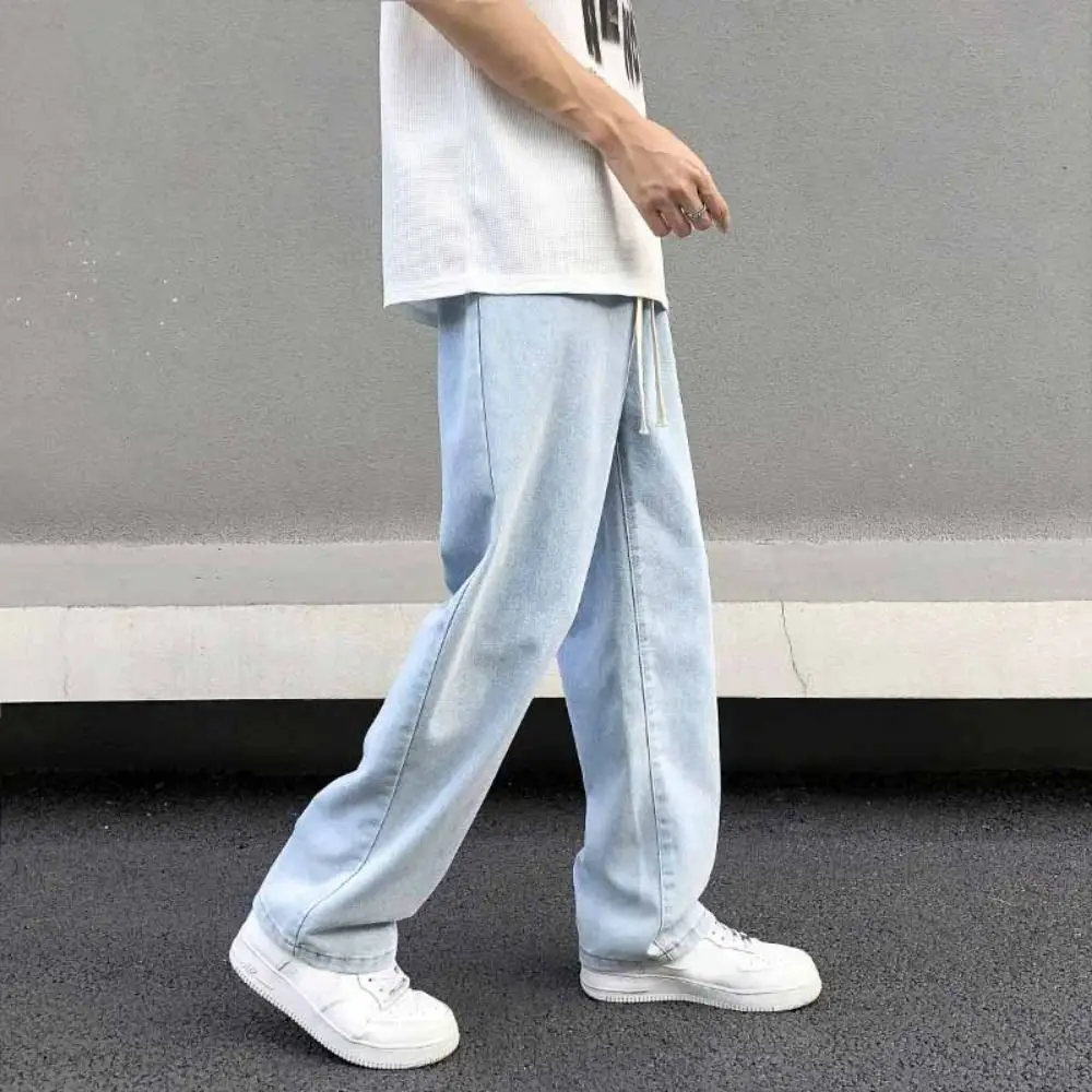 Celana Jeans Kasual Pria Pinggang Elastis Longgar Model Kaki Lebar Celana Kaki Lebar Model Lurus Desain Dasar Celana Denim Gaya Jalanan