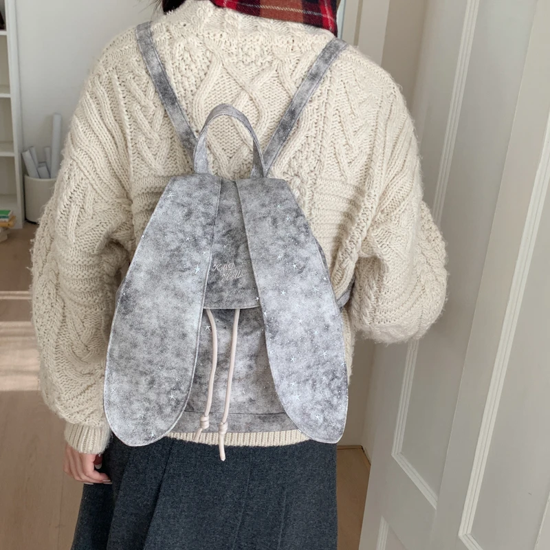 

New Style Cute Rabbit Ear Starry Sky Backpack Women's Korean Tie Dye High Appearance Travel Bag Small Daily Commuter Bag