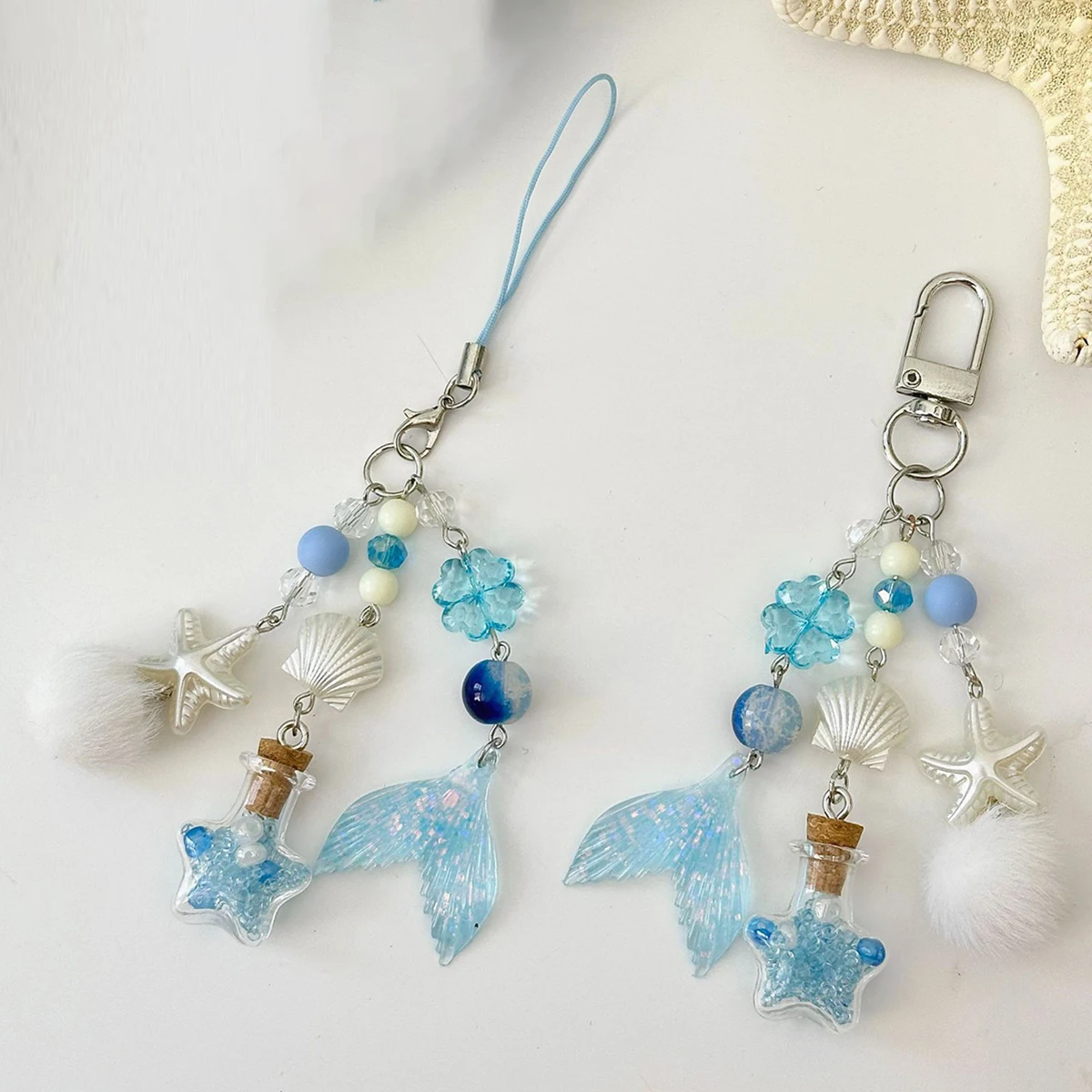 

Брелок-бутылочка для путешествий Dream Ocean: Оригинальный синий дизайн в стиле Ins, модный аксессуар с рыбьим хвостом и морской звездой, цепочка для телефона, подвеска для рюкзака, украшение