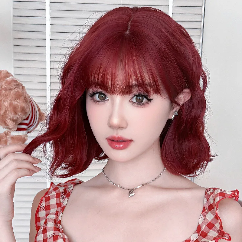 

Short Curly Wig for Women, Orange Synthetic Full Wig, Wool Curl, Egg Roll, Button Net, Bangs Wig