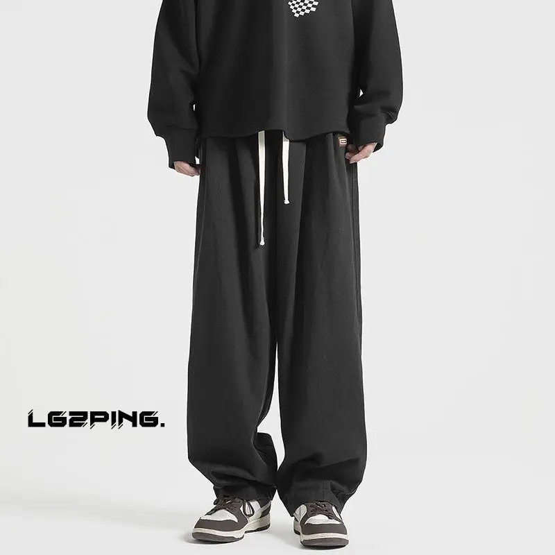 Fashion Waist Drawcord Stickers Man Sweatpants New Loose Pocket Straight Cylinder Casual Boy Sense of Design Male Trousers 2023