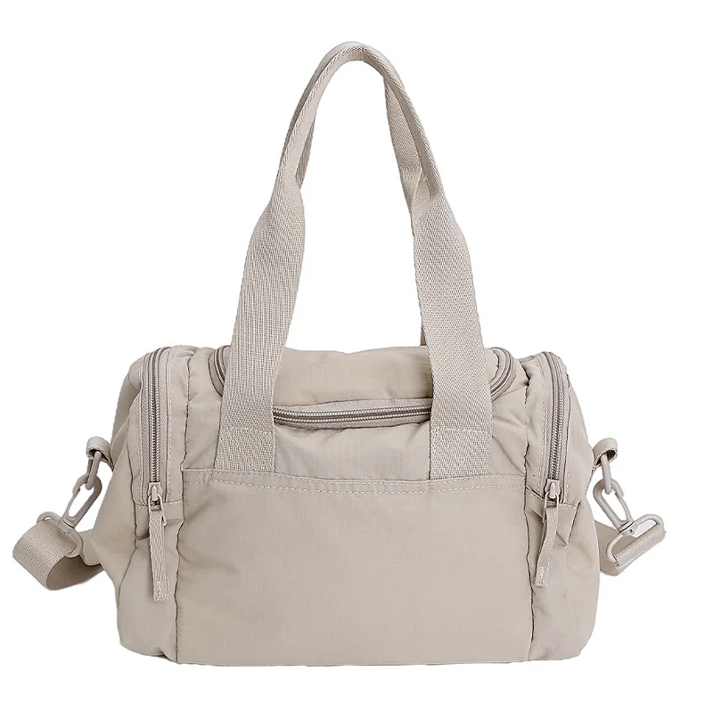 

Large-capacity nylon sports and fitness bag women hand-held travel handbag shoulder bag