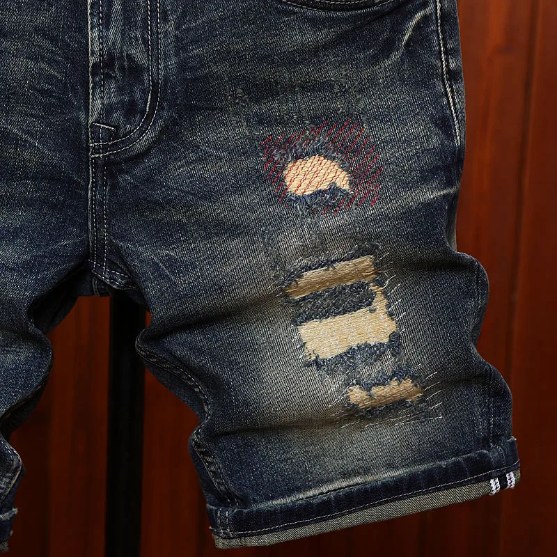 High end ripped patch denim shorts for men in the summer of 2025, scraped and fashionable trend, classic retro pants