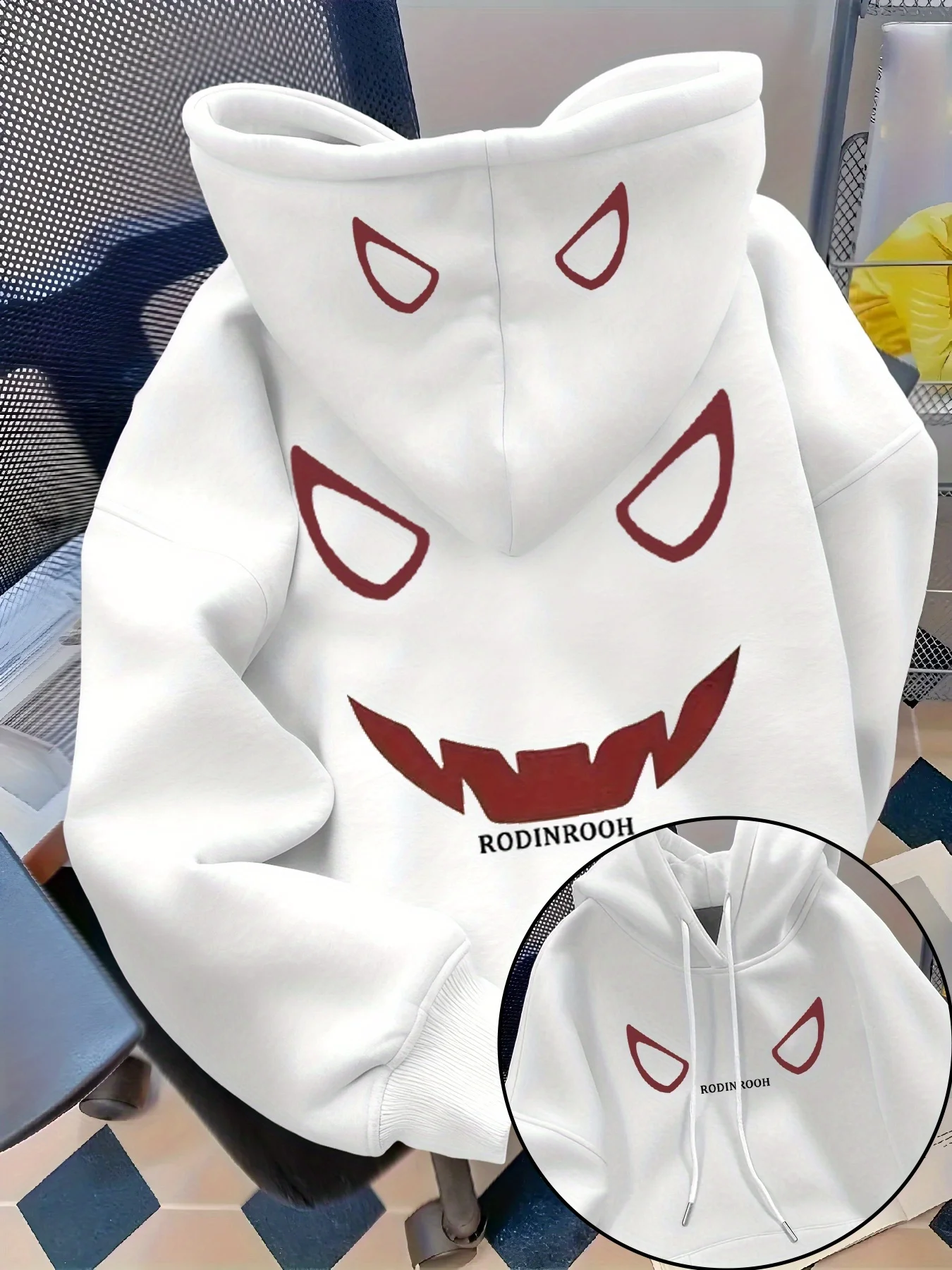 Red wine color demonic devil face printed men's hooded sweatshirt. Simple cartoon trend, soft and loose, casual hooded shirt.