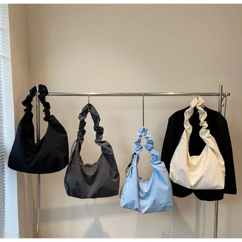 

New Women's Bag for Spring 2025, Sewn Shoulder Bag, Nylon Large Capacity Diagonal Cross Bag, Simple Korean Version Tote Bag