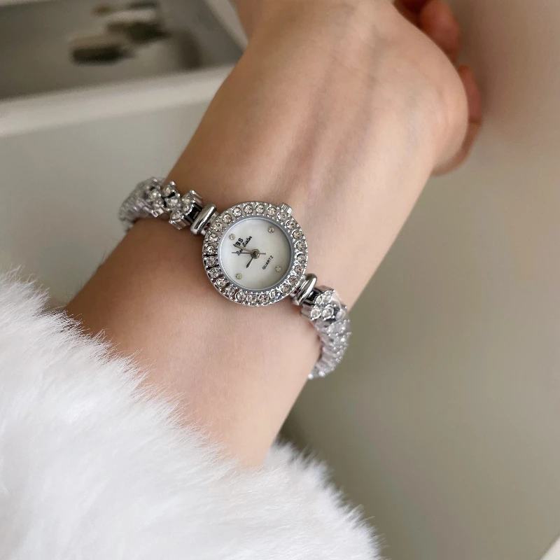 Luxury Silver bracelet Lady Simple dial quartz movement waterproof women's watch Fashion bracelet Ladies' watch birthday gift