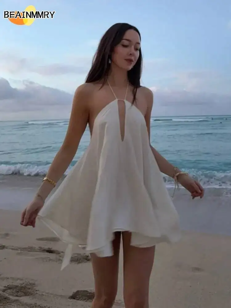 فساتين نسائية مثيرة مكشوفة الأكتاف للحفلات لعام 2025 فستان شاطئ أنيق بدون أكمام مفرغ بدون ظهر فساتين صيفية للسيدات في الشارع العالي