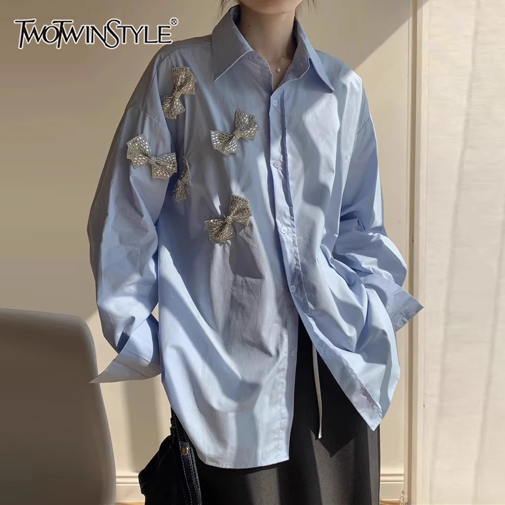 

TWOTWINSTYLE Solid Spliced Bowknot Loose Blouses for Women Lapel Long Sleeve Temperament Minimalist Shirt Female Fashion