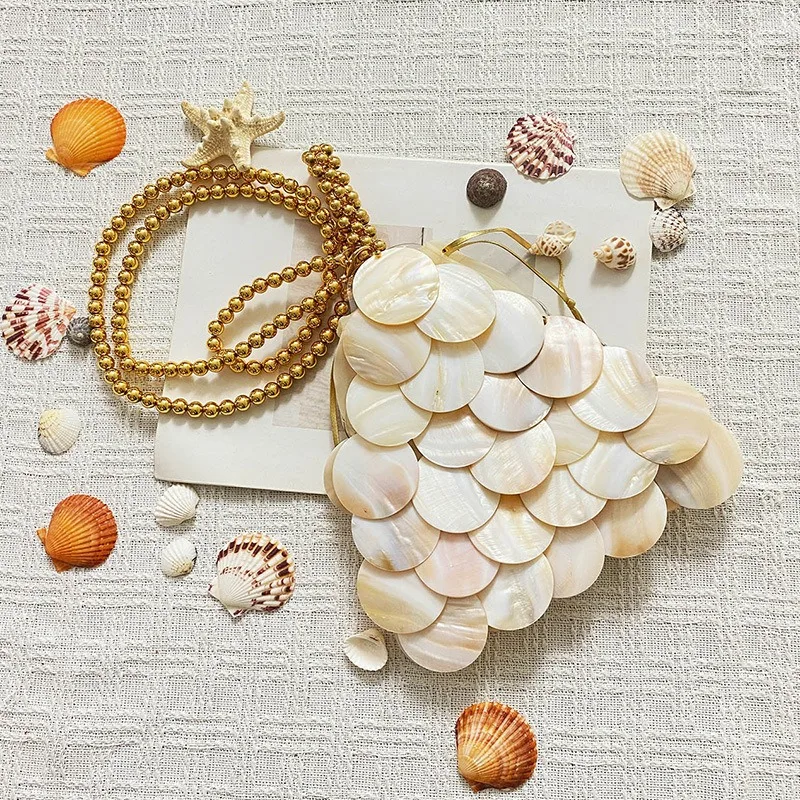 

2025 new women sequins hand-woven beaded shell bag luxury fashion natural crumb party elegant handbag vacation beach bucket bag
