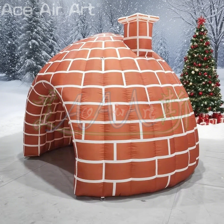 Beau igloo gonflable au mur de briques rouges avec cheminée, tente dôme gonflable d'hiver pour décoration extérieure de noël, Placement de cadeaux