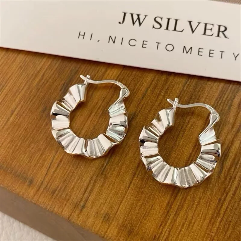 

S999 sterling silver women's exaggerated and atmospheric pleated wrinkling earrings, anti allergy fashionable earrings