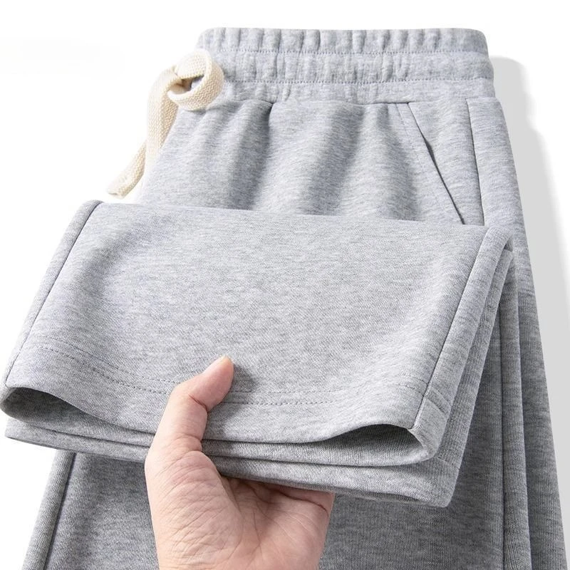 

Мужские спортивные штаны с прямыми штанинами осенью и зимой — универсальны. Они свободные, широкие брюки и повседневные драпированные брюки