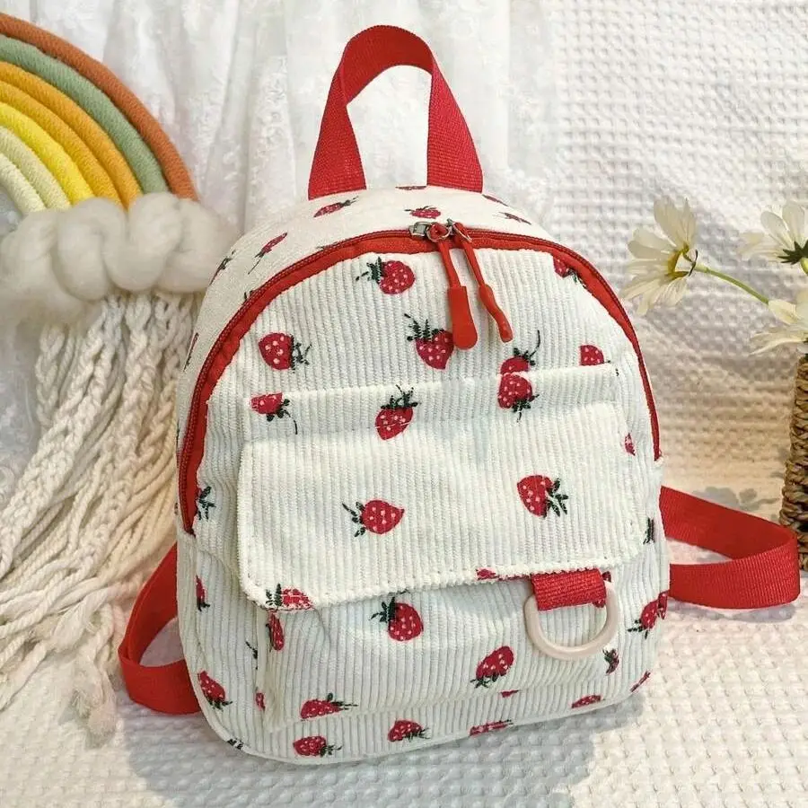 

Cute and casual mini strawberry-print corduroy backpack with red trim, lightweight and perfect for everyday use, school, or trav