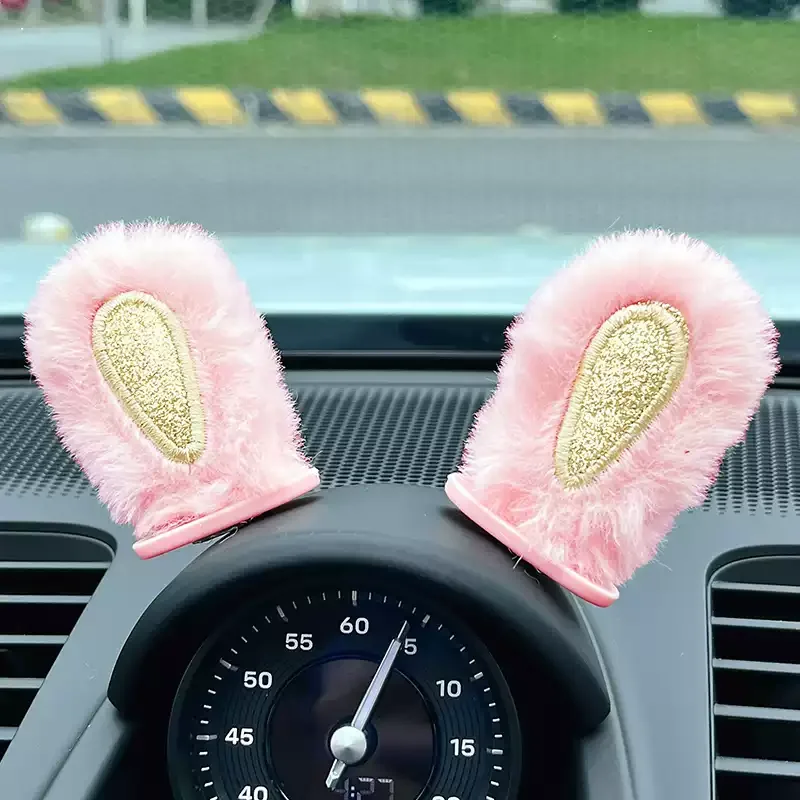 

Creative rearview mirror for electric cars, adorned with cute rabbit ears, serving as a decorative center console accessory