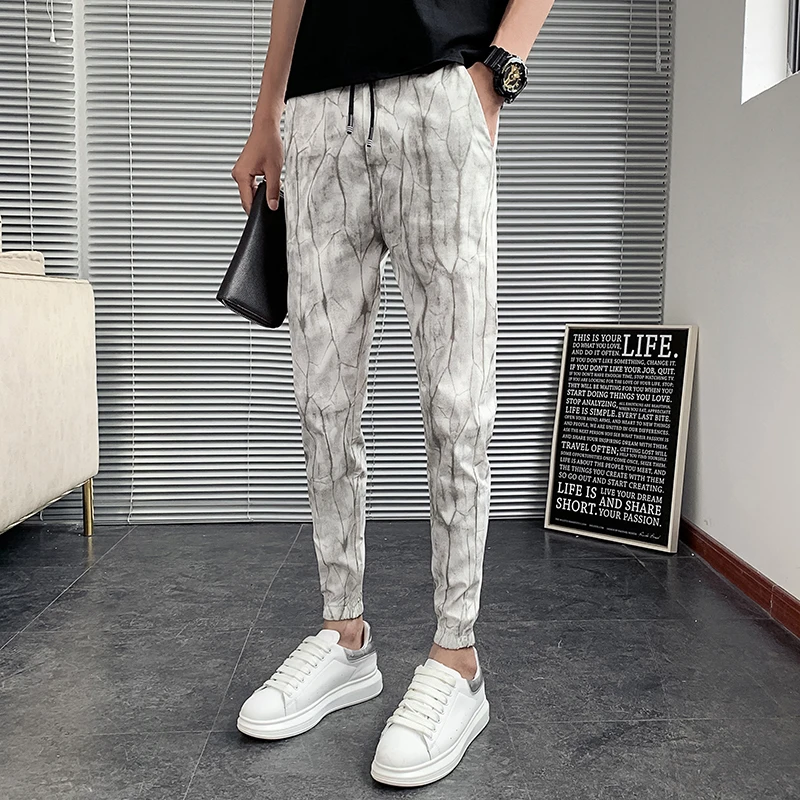 

Pantalones Hombre, новые летние мужские брюки до щиколотки, корейские модные облегающие брюки с цветочным принтом для мужчин, одежда серого/белого цвета 36-28