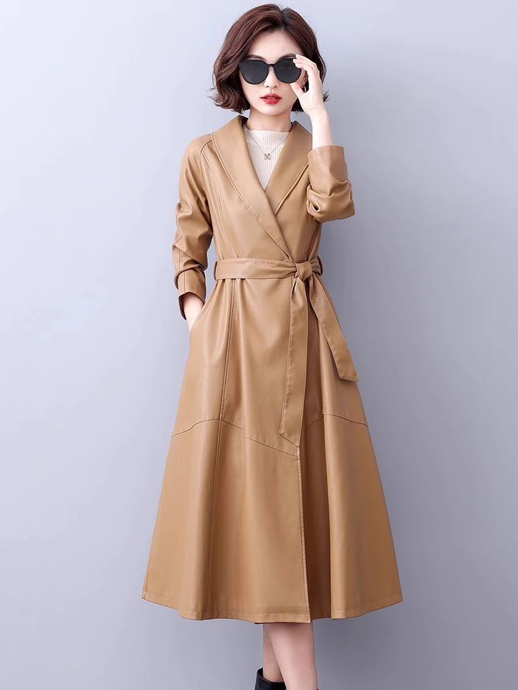 Nouveau Femmes Manteau long en cuir Printemps Automne Mode Col rabattu Lacer Mince Cuir fendu Trench-coat Occasionnel Manteau en peau de mouton