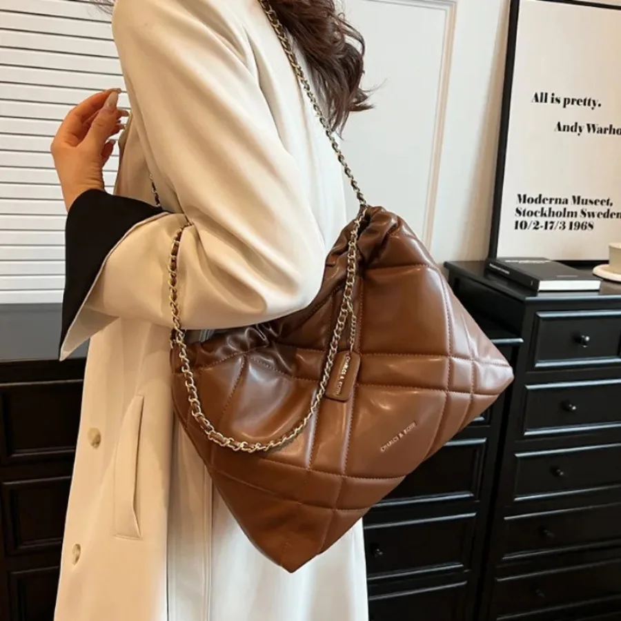

Summer new niche diamond lattice small fragrant wind popular chain slanting cross bag single shoulder bucket female bag