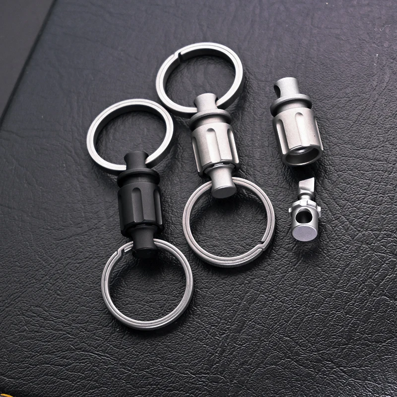 Titanium Alloy Mini Left Wheel Quick Release Keychain Men Super Light Rotatable Double-Headed Car Key Chain With Hidden Knife