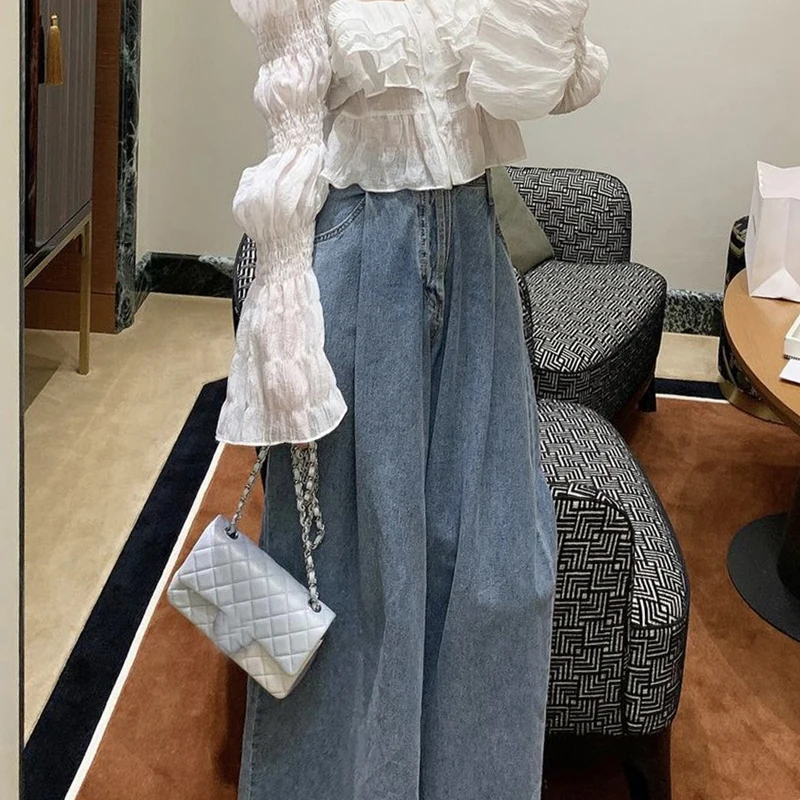 Damskie długie spodnie w stylu vintage na wiosnę, z wysokim stanem, szerokimi nogawkami, eleganckim plisowaniem na jeden guzik, luźnym krojem, uniwersalne, w ciemnym kolorze.