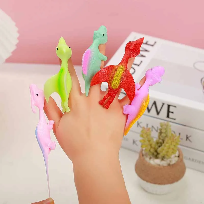 Funny Small Dinosaur Finger Catapult Brinquedos, Crianças Decompression Prank Brinquedos, Novidade Divertida Engraçada