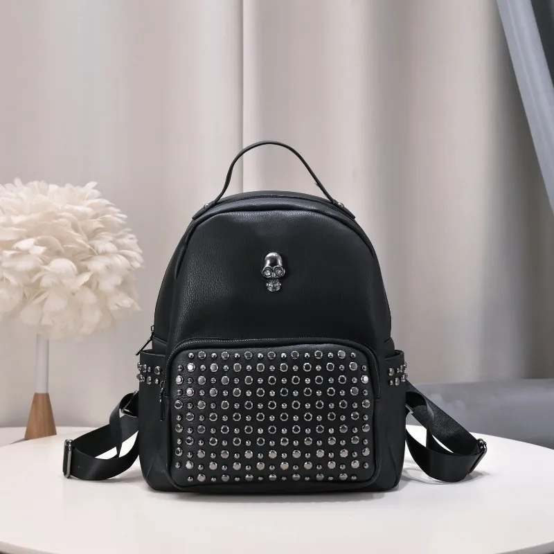 

Casual punk female soft leather student fashion rivet backpack large capacity practical travel skull lady bag