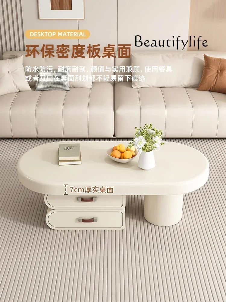 A Minimal cream style living room small apartment coffee table light luxury designer high sense oval art