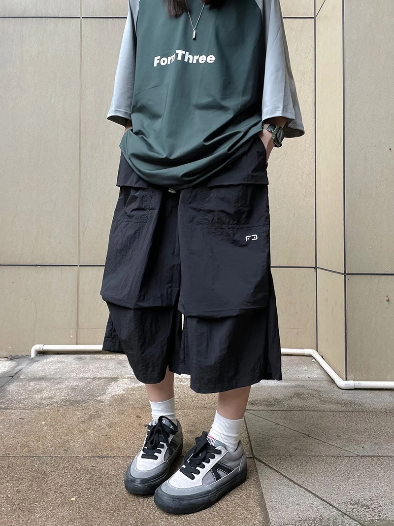 

Outdoor Casual Loose Fit Seven-Foot Pants for Men And Women with Large kets Qui Dry Thin Model American Sle Youthful