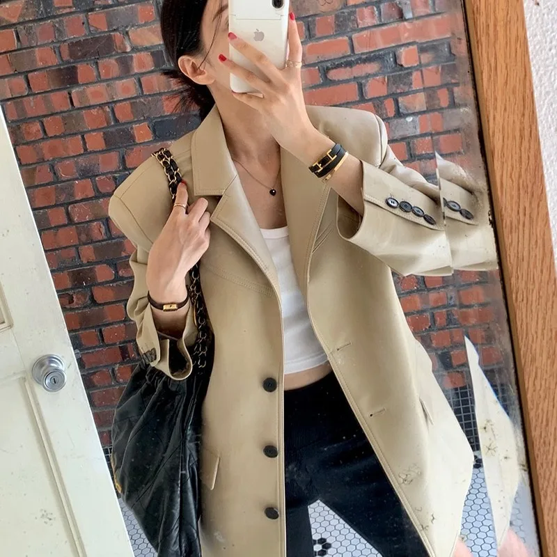 เสื้อแจ็คเก็ตหนัง PU สไตล์เรโทรสุดชิคสำหรับผู้หญิง ดีไซน์เรียบง่าย สวมใส่สบาย ให้ความรู้สึกหรูหรา เหมาะสำหรับใส่เที่ยวเล่นหรือเดินทางไปทำงาน