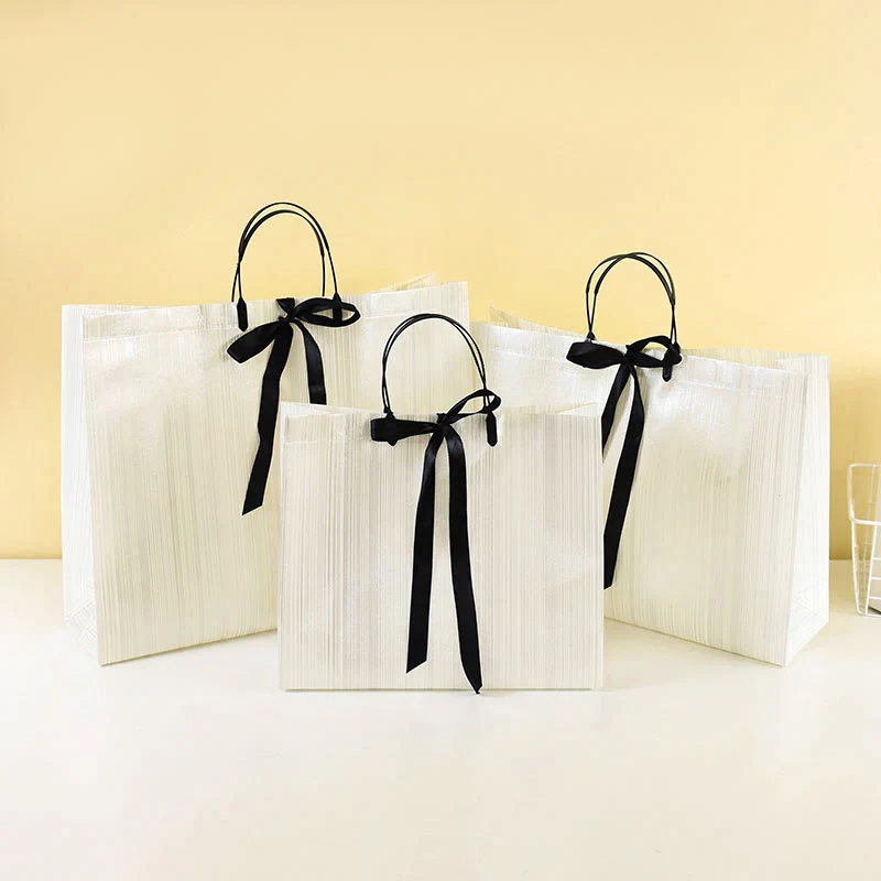 

Ribbon Bow White Tote Gifts Bags With Handle Clothes Jewelry Storage Pouch Shopping Bag Birthday Wedding Party Gift Packing Bags