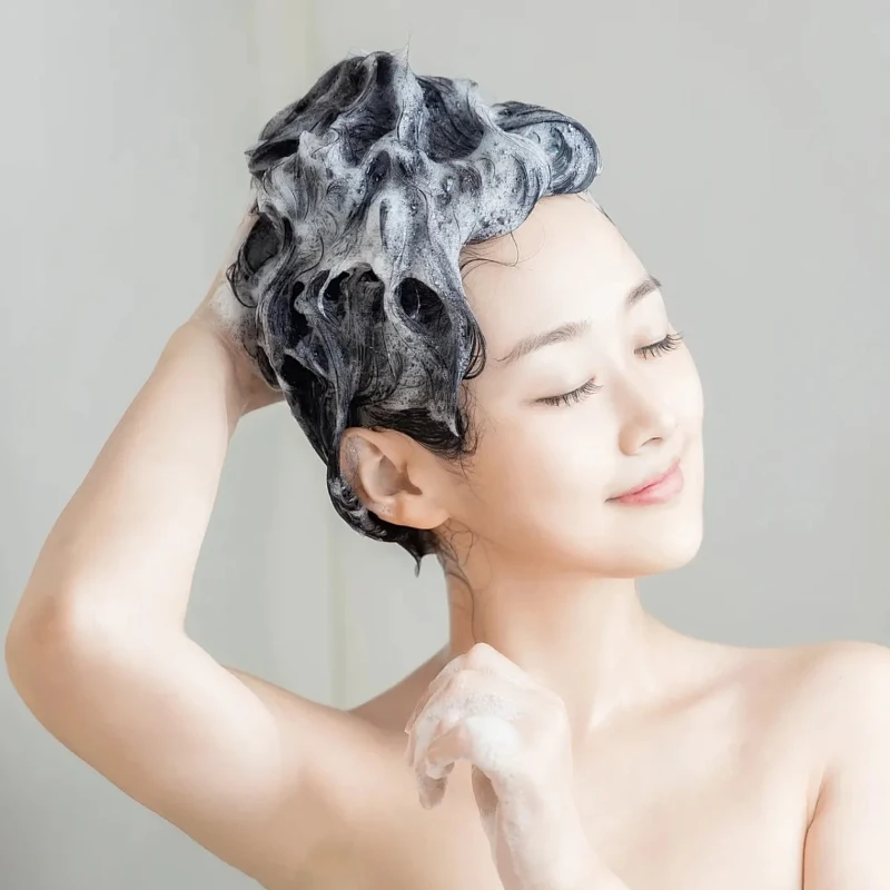 

Hair is smooth and sleek, thick and black from within