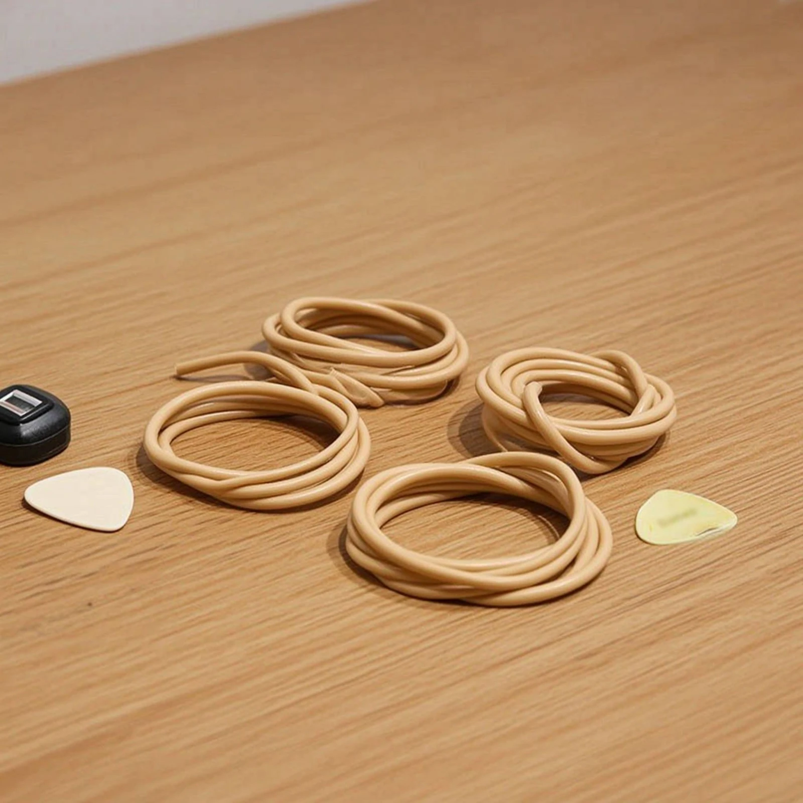 4 cordes de basse ukulélé en nylon pour une intonation améliorée, réactives et durables pour l'entretien et la pratique